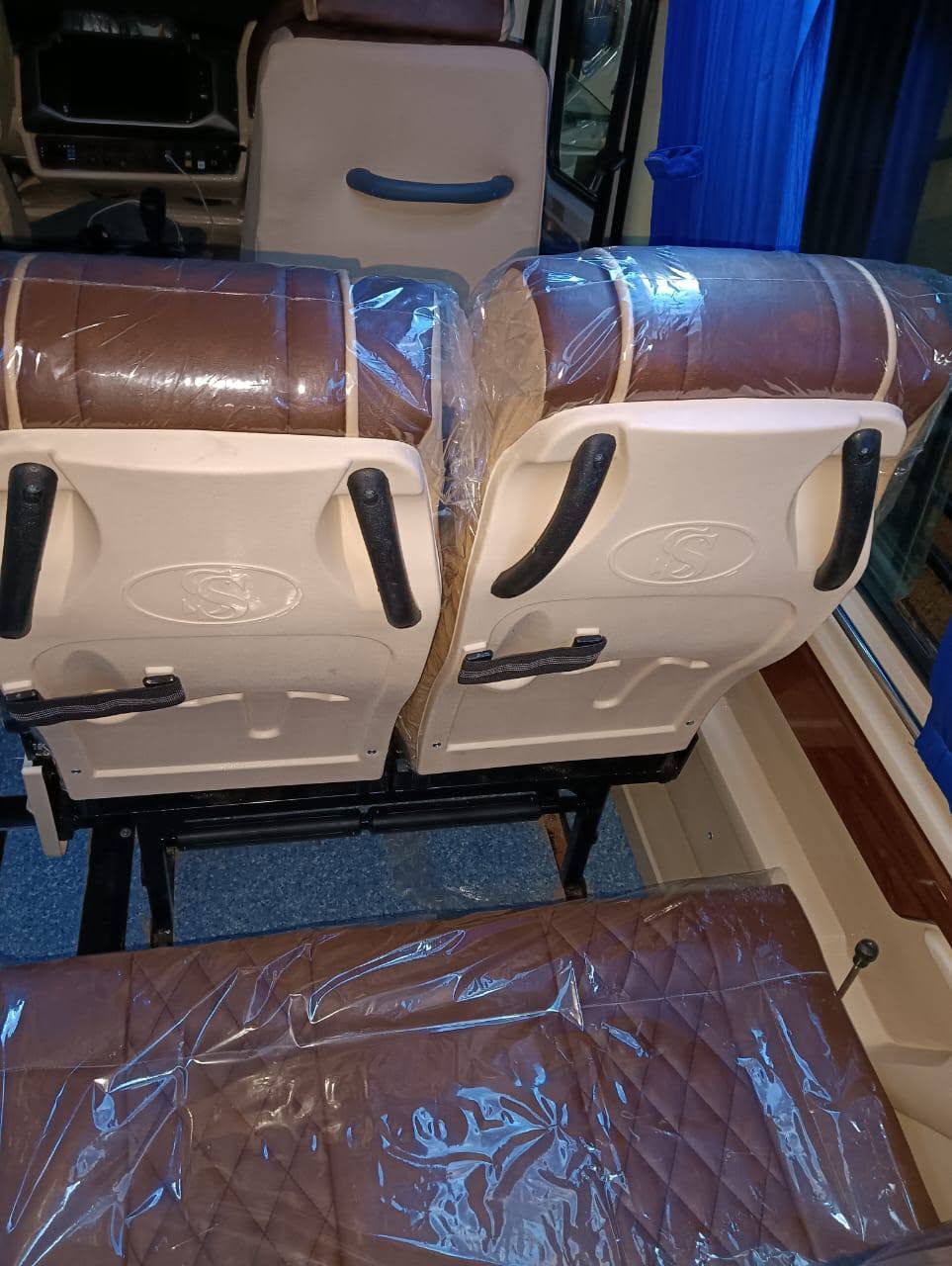 Premium brown and cream tempo traveller seats