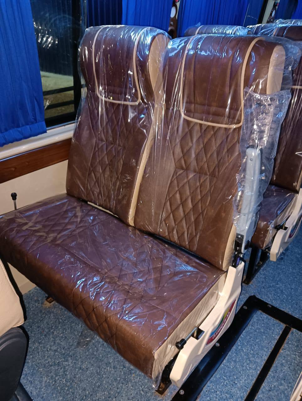 Brown diamond-quilted push-back seat