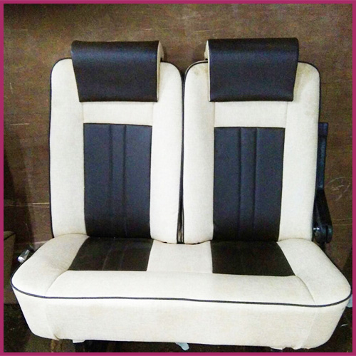 Black and cream push-back seat