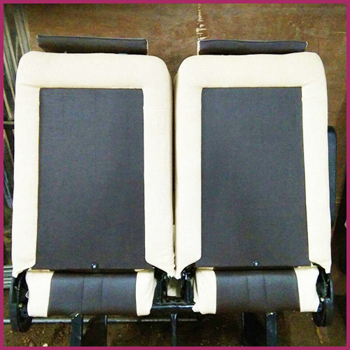 Beige and black mesh push-back seat