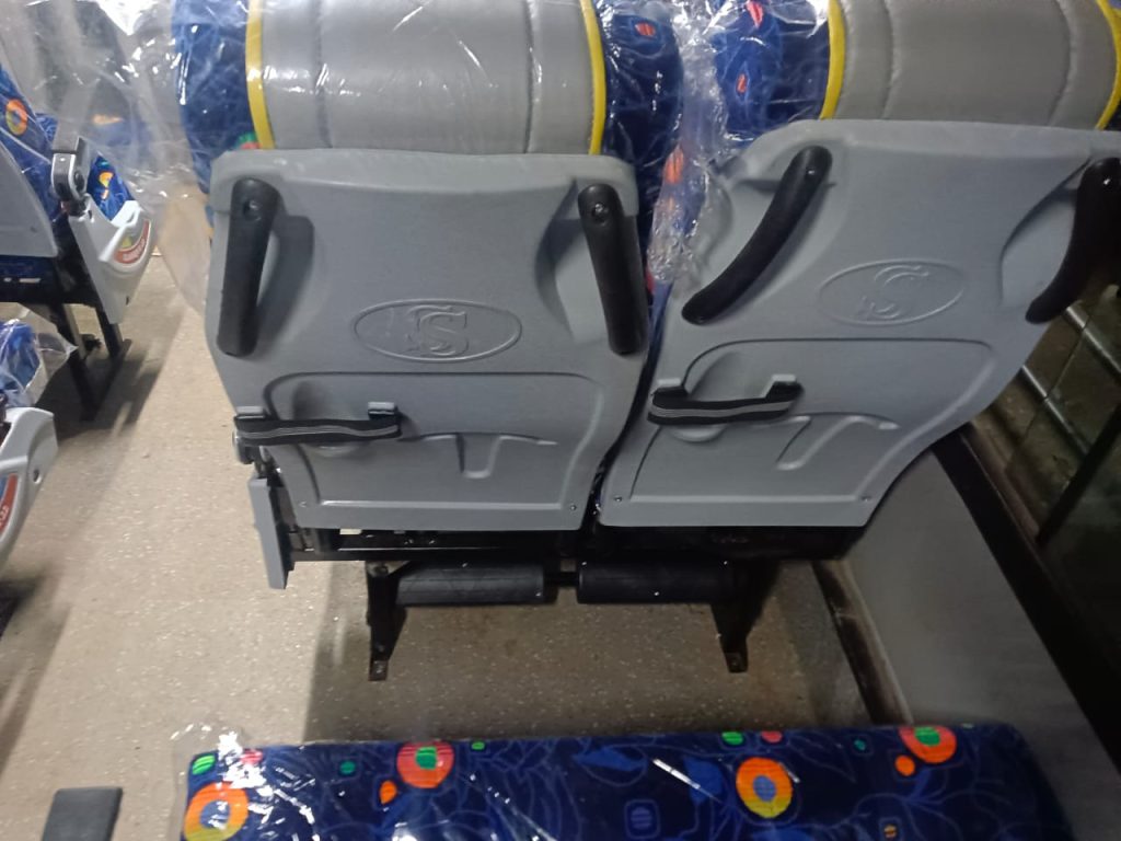 Row of grey push-back coach seats